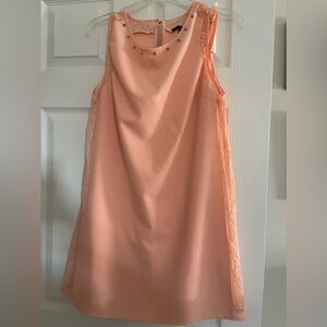 Short peach dress, great for casual events.